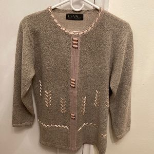 Women tops. Size M. Made in China. Tan color.
